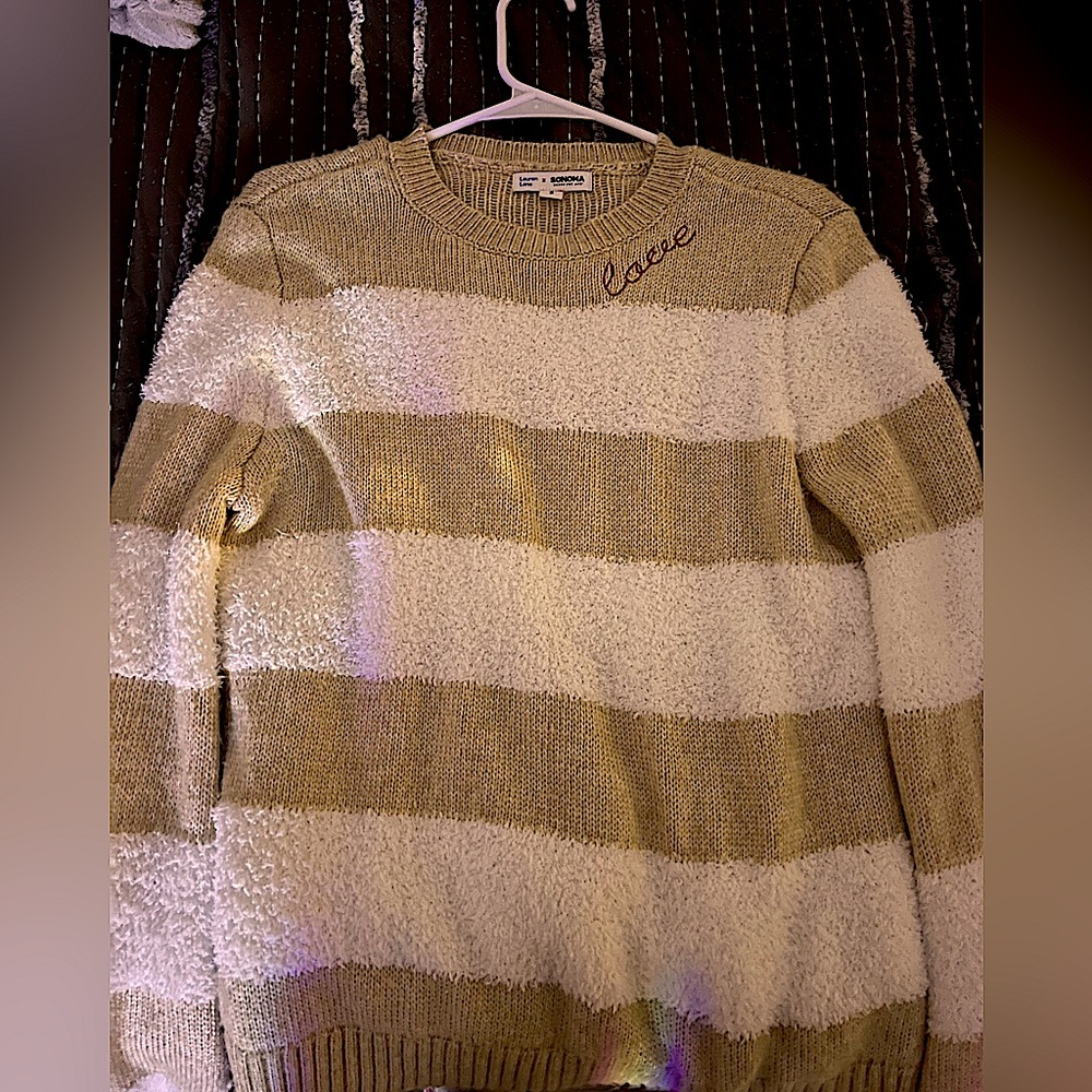 Women’s sweater with the word “love” at top in cursive and red. Size 4